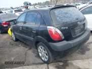 ✅ 2009 Kia Rio LX • VIN: KNADE243296481394 • Лот: 41498863. Опубликован ранее на IAAI с пробегом 59 222 миль. Бесплатный доступ к архиву аукционных продаж из США и подробный отчёт об истории автомобиля на DreamBid. Изображение 3.