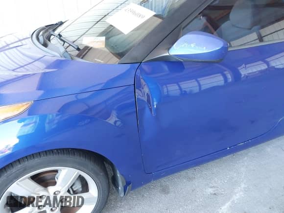 2012 Hyundai Veloster w/Red Int with VIN KMHTC6AD1CU042131, listed as a IAAI auction lot 43596089 with 161,968 mi miles and . Bid and sale history available at DreamBid. Image 6.