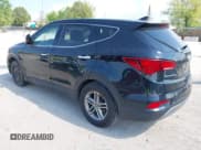 ✅ 2017 Hyundai Santa Fe 2.4L • VIN: 5XYZTDLBXHG440736 • Lot: 42234524. Listed on IAAI with 134,045 mi. Free auction sales archive from the USA and detailed vehicle history report at DreamBid. Image 3.