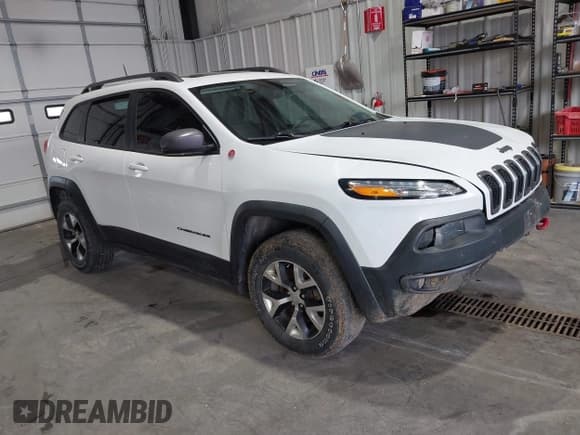 ✅ 2017 Jeep Cherokee Trailhawk • VIN: 1C4PJMBS5HW614956 • Лот: 42079991. Опубликован ранее на IAAI с пробегом 143 378 миль. Бесплатный доступ к архиву аукционных продаж из США и подробный отчёт об истории автомобиля на DreamBid. Изображение 1.