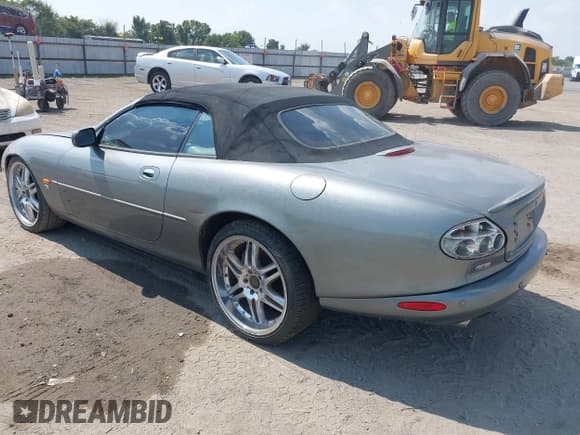 ✅ 2003 Jaguar XK • VIN: SAJDA42B233A34355 • Lot: 43245245. Listed on IAAI with 135,282 mi. Free auction sales archive from the USA and detailed vehicle history report at DreamBid. Image 3.