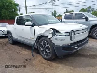 ✅ 2023 Rivian R1T Adventure • VIN: 7FCTGAAA5PN023786 • Lot: 42617396. Wystawiony na IAAI z przebiegiem 38 879 mil. Bezpłatny archiwum sprzedaży aukcyjnych z USA i szczegółowy raport historii pojazdu na DreamBid. Zdjęcie 1.