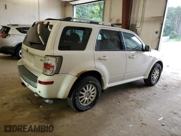 ✅ 2009 Mercury Mariner Premier • VIN: 4M2CU97G49KJ26012 • Lot: 68007975. Listed on Copart with 153,173 mi. Free auction sales archive from the USA and detailed vehicle history report at DreamBid. Image 3.