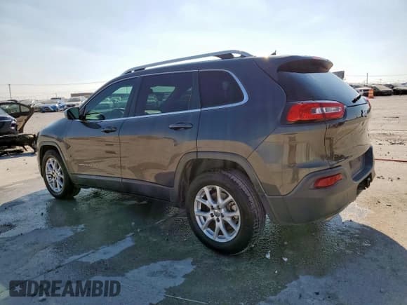 ✅ 2015 Jeep Cherokee Latitude • VIN: 1C4PJLCS5FW516841 • Lot: 84189215. Listed on Copart with 164,493 mi. Free auction sales archive from the USA and detailed vehicle history report at DreamBid. Image 2.