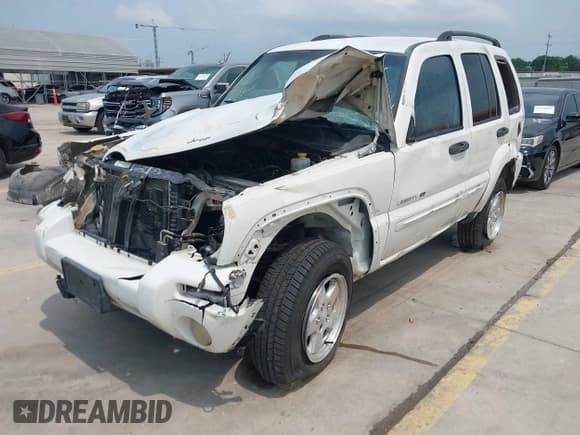 ✅ 2002 Jeep Liberty Limited • VIN: 1J4GL58K32W145911 • Lot: 42162631. Listed on IAAI with 213,446 mi. Free auction sales archive from the USA and detailed vehicle history report at DreamBid. Image 2.
