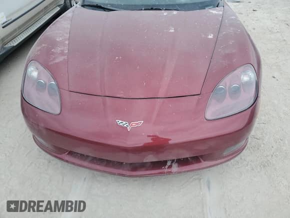 2006 Chevrolet Corvette с VIN 1G1YY26U565100990, выставлен на аукционе Copart как лот 76692824 с пробегом Не указан миль и Списание • Salvage title. История ставок и продаж доступна на DreamBid. Изображение 11.