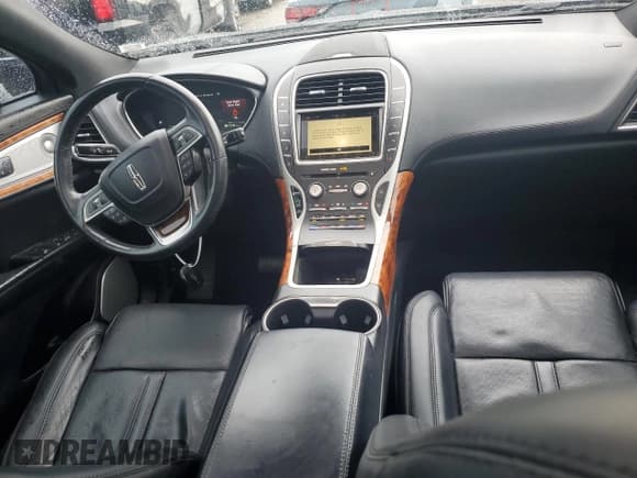 ✅ 2019 Lincoln Nautilus Reserve • VIN: 2LMPJ6LP0KBL21979 • Lot: 66801724. Wystawiony na Copart z przebiegiem 94 603 mil. Bezpłatny archiwum sprzedaży aukcyjnych z USA i szczegółowy raport historii pojazdu na DreamBid. Zdjęcie 8.