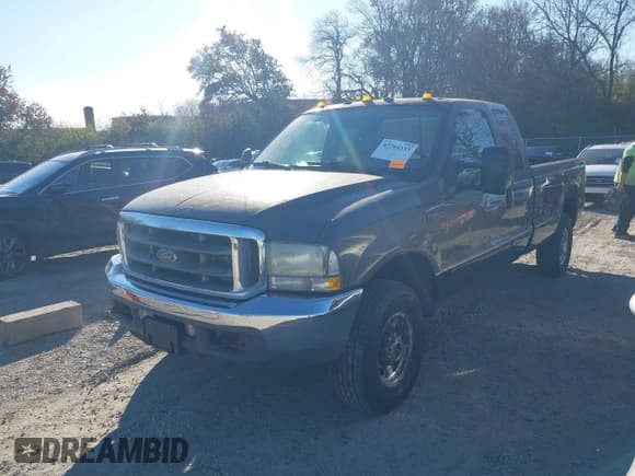 ✅ 2002 Ford F-250 XL • VIN: 1FTNX21F82EA53163 • Lot: 43704133. Listed on IAAI with 250,086 mi. Free auction sales archive from the USA and detailed vehicle history report at DreamBid. Image 2.
