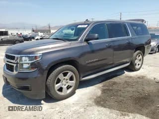 ✅ 2016 Chevrolet Suburban LS • VIN: 1GNSCGEC7GR437910 • Lot: 67787405. Wystawiony na Copart z przebiegiem 158 897 mil. Bezpłatny archiwum sprzedaży aukcyjnych z USA i szczegółowy raport historii pojazdu na DreamBid. Zdjęcie 1.