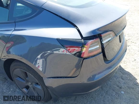 ✅ 2023 Tesla Model 3 • VIN: 5YJ3E1EA8PF400213 • Lot: 42117720. Listed on IAAI with 54,529 mi. Free auction sales archive from the USA and detailed vehicle history report at DreamBid. Image 6.