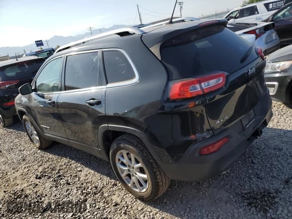 ✅ 2014 Jeep Cherokee Altitude • VIN: 1C4PJMCS1EW124461 • Lot: 62885365. Listed on Copart with 99,760 mi. Free auction sales archive from the USA and detailed vehicle history report at DreamBid. Image 2.