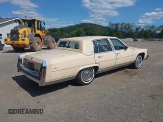 ✅ 1988 Cadillac Brougham • VIN: 1G6DW51Y8JR764728 • Лот: 43152182. Опубликован ранее на IAAI с пробегом 53 299 миль. Бесплатный доступ к архиву аукционных продаж из США и подробный отчёт об истории автомобиля на DreamBid. Изображение 4.