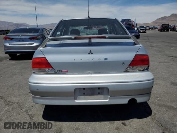✅ 2002 Mitsubishi Lancer OZ-Rally • VIN: JA3AJ86E12U057563 • Lot: 67379775. Listed on Copart with 187,217 mi. Free auction sales archive from the USA and detailed vehicle history report at DreamBid. Image 6.