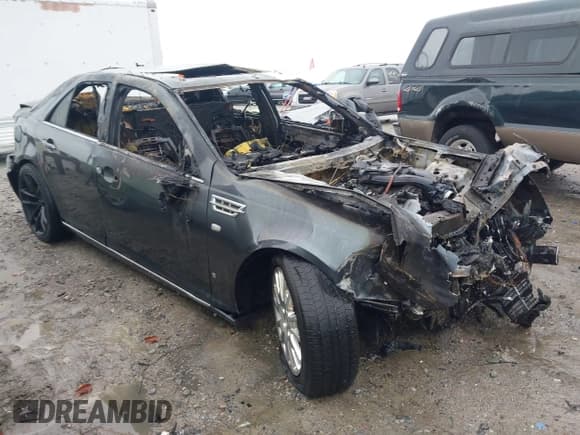 ✅ 2009 Cadillac STS AWD • VIN: 1G6DA67V990142527 • Лот: 41575364. Опубликован ранее на IAAI с пробегом Не указан. Бесплатный доступ к архиву аукционных продаж из США и подробный отчёт об истории автомобиля на DreamBid. Изображение 1.