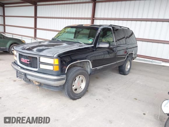 ✅ 1999 GMC Yukon • VIN: 1GKEK13R2XJ754770 • Lot: 42876387. Listed on IAAI with 233,448 mi. Free auction sales archive from the USA and detailed vehicle history report at DreamBid. Image 2.
