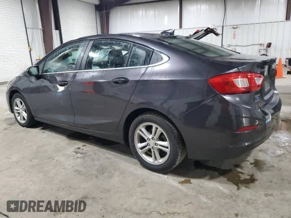 2017 Chevrolet Cruze LT with VIN 1G1BE5SM7H7131865, listed as a Copart auction lot 85877425 with 144,207 mi miles and Salvage title. Bid and sale history available at DreamBid. Image 2.