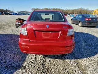 ✅ 2012 Suzuki SX4 LE • VIN: JS2YC5A36C6303887 • Lot: 94768565. Wystawiony na Copart z przebiegiem Nie podano. Bezpłatny archiwum sprzedaży aukcyjnych z USA i szczegółowy raport historii pojazdu na DreamBid. Zdjęcie 6.