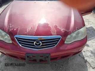 ✅ 2001 Mazda Millenia • VIN: JM1TA221911707878 • Lot: 42441666. Wystawiony na IAAI z przebiegiem 103 196 mil. Bezpłatny archiwum sprzedaży aukcyjnych z USA i szczegółowy raport historii pojazdu na DreamBid. Zdjęcie 6.