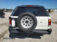 ✅ 1995 Isuzu Rodeo LS • VIN: 4S2CG58V2S4308499 • Lot: 90679075. Wystawiony na Copart z przebiegiem 193 763 mil. Bezpłatny archiwum sprzedaży aukcyjnych z USA i szczegółowy raport historii pojazdu na DreamBid. Zdjęcie 6.