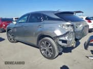 ✅ 2022 Lexus RX 350 • VIN: 2T2HZMDAXNC324133 • Lot: 91471065. Listed on Copart with 74,518 mi. Free auction sales archive from the USA and detailed vehicle history report at DreamBid. Image 2.