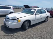 ✅ 2001 Lincoln Continental • VIN: 1LN8M82W11Y694879 • Lot: 42313003. Wystawiony na IAAI z przebiegiem Nie podano. Bezpłatny archiwum sprzedaży aukcyjnych z USA i szczegółowy raport historii pojazdu na DreamBid. Zdjęcie 18.