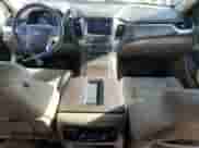 2015 Chevrolet Tahoe LTZ with VIN 1GNSKCKC1FR118128, listed as a Copart auction lot 89589135 with 129,932 mi miles and Salvage title. Bid and sale history available at DreamBid. Image 8.