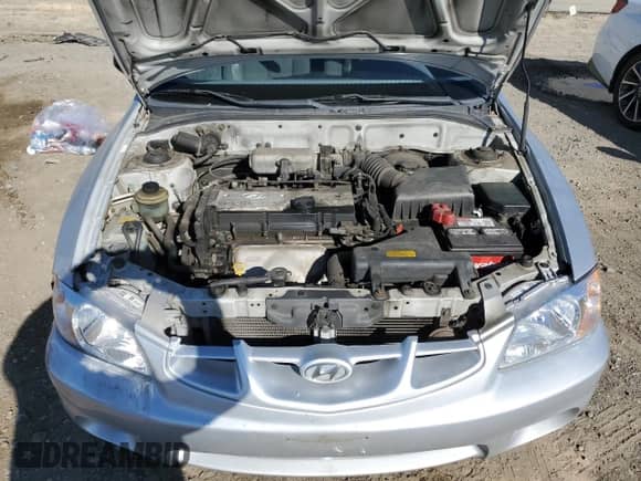 2001 Hyundai Accent GS z VIN KMHCG35CX1U138406, wystawiony jako Copart lot #81693065 z przebiegiem 100 605 mil mil oraz Szkoda całkowita • Salvage title. Historia ofert i sprzedaży dostępna na DreamBid. Obrazek 11.