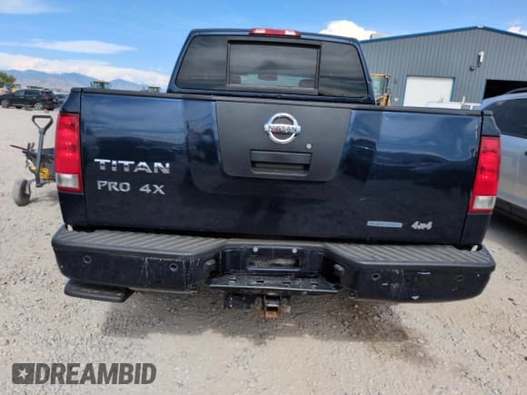 ✅ 2011 Nissan Titan Pro-4X • VIN: 1N6BA0EC3BN322837 • Лот: 60617675. Опубликован ранее на Copart с пробегом 196 657 миль. Бесплатный доступ к архиву аукционных продаж из США и подробный отчёт об истории автомобиля на DreamBid. Изображение 6.