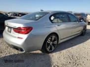 ✅ 2017 BMW 7 Series 740i • VIN: WBA7E2C30HG740990 • Lot: 67099225. Listed on Copart with 102,873 mi. Free auction sales archive from the USA and detailed vehicle history report at DreamBid. Image 3.