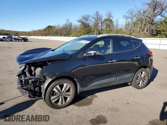 2015 Hyundai Tucson Limited with VIN KM8JUCAG0FU088325, listed as a Copart auction lot 82262885 with 66,470 mi miles and Salvage title. Bid and sale history available at DreamBid. Image 1.
