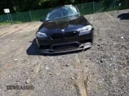 ✅ 2013 BMW M5 • VIN: WBSFV9C52DC773993 • Lot: 70976204. Wystawiony na Copart z przebiegiem 145 502 mil. Bezpłatny archiwum sprzedaży aukcyjnych z USA i szczegółowy raport historii pojazdu na DreamBid. Zdjęcie 11.