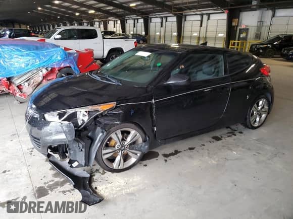 2012 Hyundai Veloster w/Red Int z VIN KMHTC6AD1CU054411, wystawiony jako Copart lot #73357964 z przebiegiem 12 486 mil mil oraz Szkoda całkowita • Salvage title. Historia ofert i sprzedaży dostępna na DreamBid. Obrazek 1.