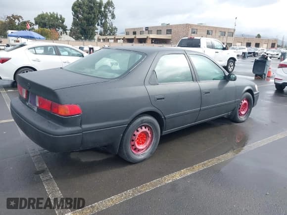 ✅ 2001 Toyota Camry LE • VIN: JT2BG22K310558143 • Lot: 43726878. Listed on IAAI with 227,355 mi. Free auction sales archive from the USA and detailed vehicle history report at DreamBid. Image 4.