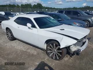 ✅ 2014 Dodge Challenger Rallye Redline • VIN: 2C3CDYAG0EH251037 • Lot: 43403130. Listed on IAAI with 221,133 mi. Free auction sales archive from the USA and detailed vehicle history report at DreamBid. Image 1.