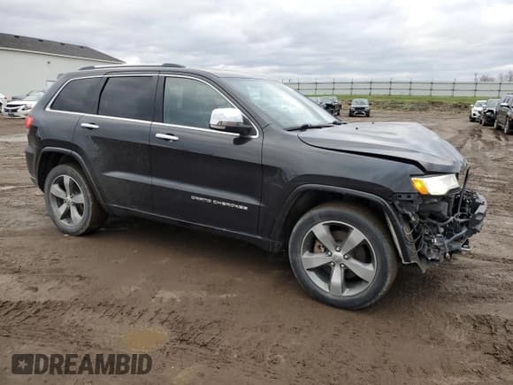 ✅ 2015 Jeep Grand Cherokee Overland • VIN: 1C4RJFCM4FC706109 • Lot: 81279744. Listed on Copart with 160,295 mi. Free auction sales archive from the USA and detailed vehicle history report at DreamBid. Image 4.