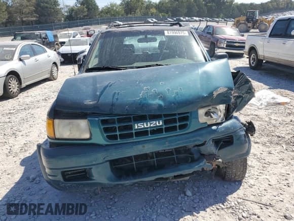 ✅ 1999 Isuzu Rodeo S • VIN: 4S2CM58W4X4330190 • Lot: 81996975. Wystawiony na Copart z przebiegiem 167 032 mil. Bezpłatny archiwum sprzedaży aukcyjnych z USA i szczegółowy raport historii pojazdu na DreamBid. Zdjęcie 5.