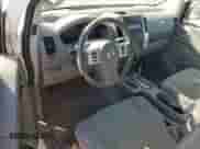 2014 Nissan Frontier S z VIN 1N6BD0CT6EN769421, wystawiony jako Copart lot #85130215 z przebiegiem 117 352 mil mil oraz Czysty tytuł • Clean title. Historia ofert i sprzedaży dostępna na DreamBid. Obrazek 8.