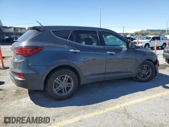 ✅ 2018 Hyundai Santa Fe 2.4L • VIN: 5XYZT3LB9JG523560 • Lot: 81779345. Listed on Copart with 106,399 mi. Free auction sales archive from the USA and detailed vehicle history report at DreamBid. Image 3.