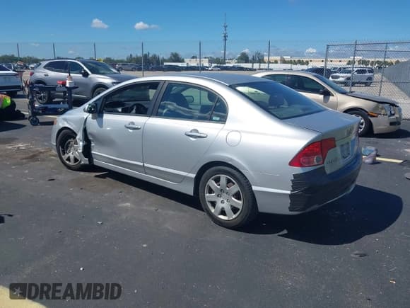 ✅ 2007 Honda Civic LX • VIN: 1HGFA16577L106777 • Lot: 43344379. Listed on IAAI with 143,117 mi. Free auction sales archive from the USA and detailed vehicle history report at DreamBid. Image 3.