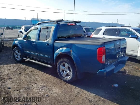 ✅ 2005 Nissan Frontier Nismo • VIN: 1N6AD07W15C408190 • Lot: 43790734. Listed on IAAI with 186,866 mi. Free auction sales archive from the USA and detailed vehicle history report at DreamBid. Image 3.