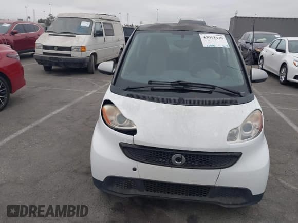 ✅ 2015 Smart fortwo Passion • VIN: WMEEJ3BA7FK808886 • Лот: 43013470. Опубликован ранее на IAAI с пробегом 75 891 миль. Бесплатный доступ к архиву аукционных продаж из США и подробный отчёт об истории автомобиля на DreamBid. Изображение 6.