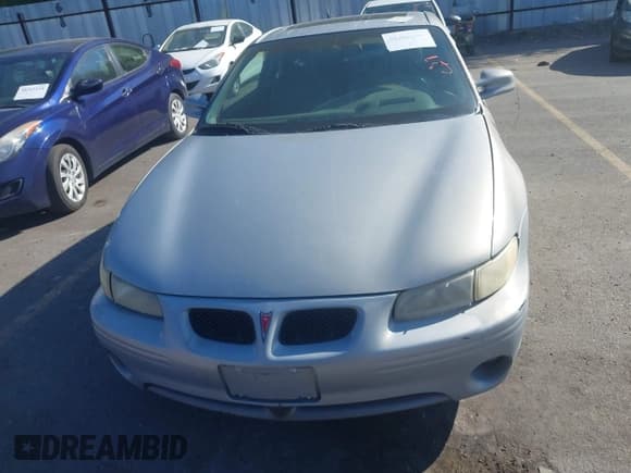 ✅ 2000 Pontiac Grand Prix GTP • VIN: 1G2WR1217YF175046 • Лот: 40203307. Опубликован ранее на IAAI с пробегом 234 063 миль. Бесплатный доступ к архиву аукционных продаж из США и подробный отчёт об истории автомобиля на DreamBid. Изображение 6.
