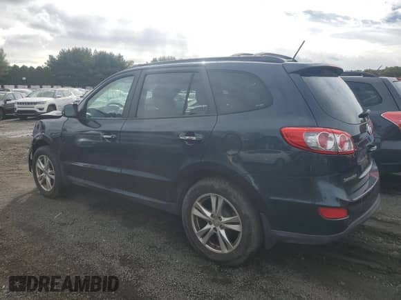 2012 Hyundai Santa Fe Limited с VIN 5XYZK3AB7CG141455, выставлен на аукционе Copart как лот 75635924 с пробегом 122 165 миль миль и Списание • Salvage title. История ставок и продаж доступна на DreamBid. Изображение 2.