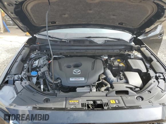 ✅ 2024 Mazda CX-5 Signature • VIN: JM3KFBXYXR0429715 • Lot: 62572165. Listed on Copart with 6,056 mi. Free auction sales archive from the USA and detailed vehicle history report at DreamBid. Image 12.