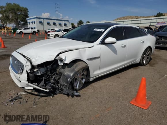 ✅ 2014 Jaguar XJ Portfolio • VIN: SAJWA2GZ0E8V61493 • Lot: 68814615. Listed on Copart with 84,526 mi. Free auction sales archive from the USA and detailed vehicle history report at DreamBid. Image 1.