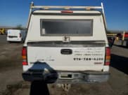 ✅ 2004 GMC Sierra 1500 SLE • VIN: 1GTEK14T04Z138911 • Лот: 53891075. Опубликован ранее на Copart с пробегом 166 864 миль. Бесплатный доступ к архиву аукционных продаж из США и подробный отчёт об истории автомобиля на DreamBid. Изображение 6.