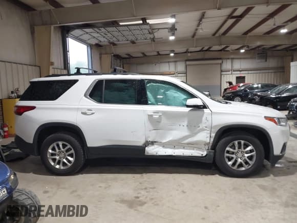 ✅ 2020 Chevrolet Traverse LT Cloth • VIN: 1GNERGKW0LJ132610 • Lot: 41971611. Listed on IAAI with 80,706 mi. Free auction sales archive from the USA and detailed vehicle history report at DreamBid. Image 13.