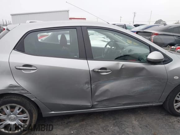 ✅ 2012 Mazda 2 Sport • VIN: JM1DE1KZ2C0145209 • Lot: 43779983. Listed on IAAI with 74,127 mi. Free auction sales archive from the USA and detailed vehicle history report at DreamBid. Image 13.