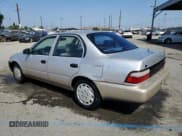 ✅ 1997 Toyota Corolla CE • VIN: 1NXBA02E8VZ562013 • Lot: 82233775. Wystawiony na Copart z przebiegiem 163 613 mil. Bezpłatny archiwum sprzedaży aukcyjnych z USA i szczegółowy raport historii pojazdu na DreamBid. Zdjęcie 2.