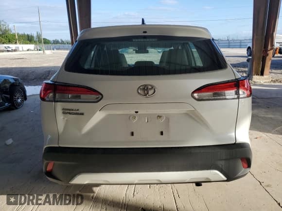 ✅ 2022 Toyota Corolla Cross L • VIN: 7MUAAAAG4NV020474 • Lot: 87018265. Listed on Copart with 29,372 mi. Free auction sales archive from the USA and detailed vehicle history report at DreamBid. Image 6.